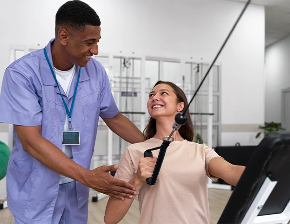 Physiotherapist guiding patient through rehabilitation exercises